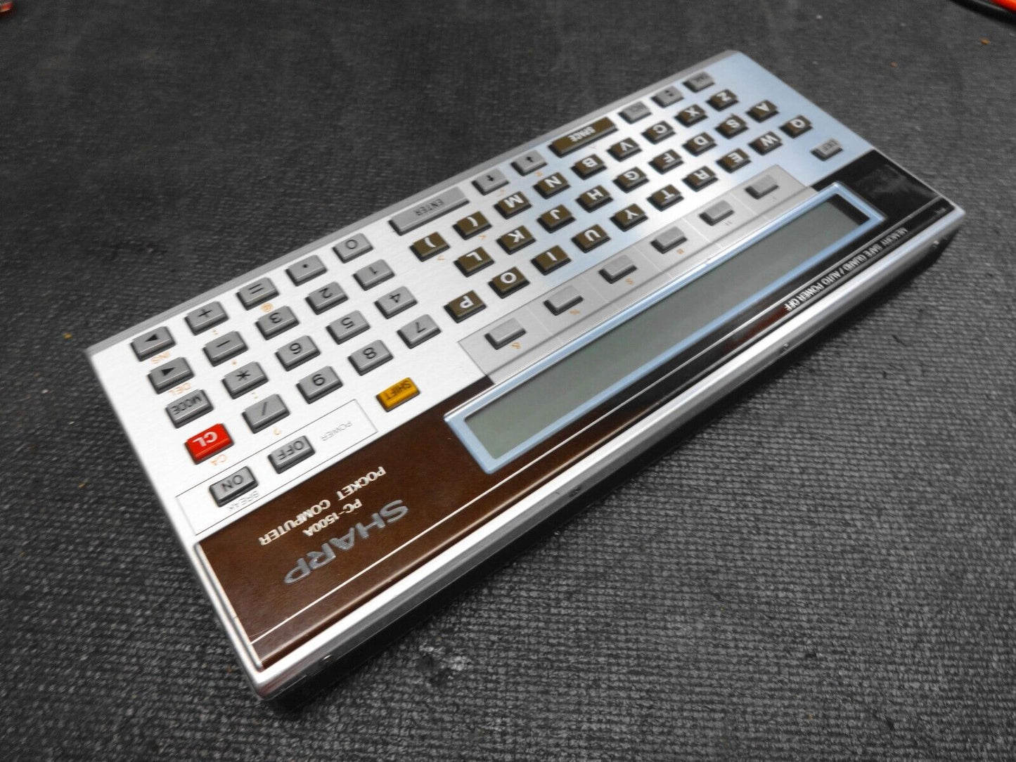 SHARP PC-1500A Pocket Computer W/ Box, Manuals and Case