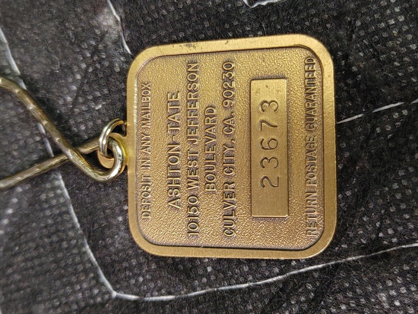 Vintage Ashton Tate Friday! Brass Keychain Old Software Advertising