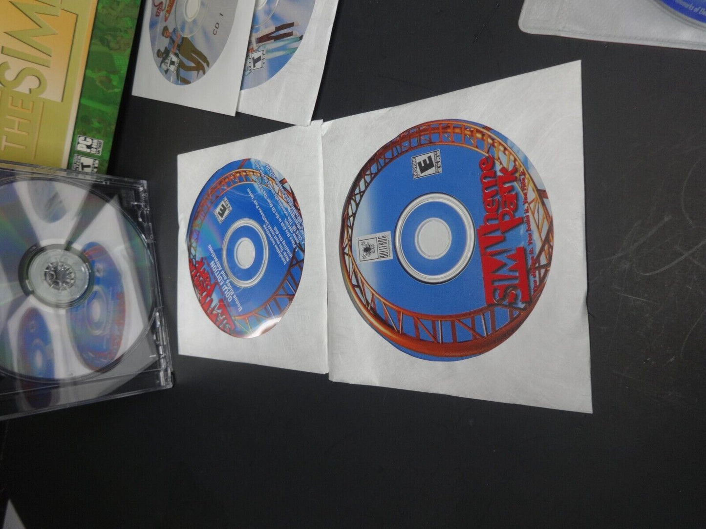 The SIM Collection Theme Park SimCity 3000 The Sims Deluxe The Sims Online