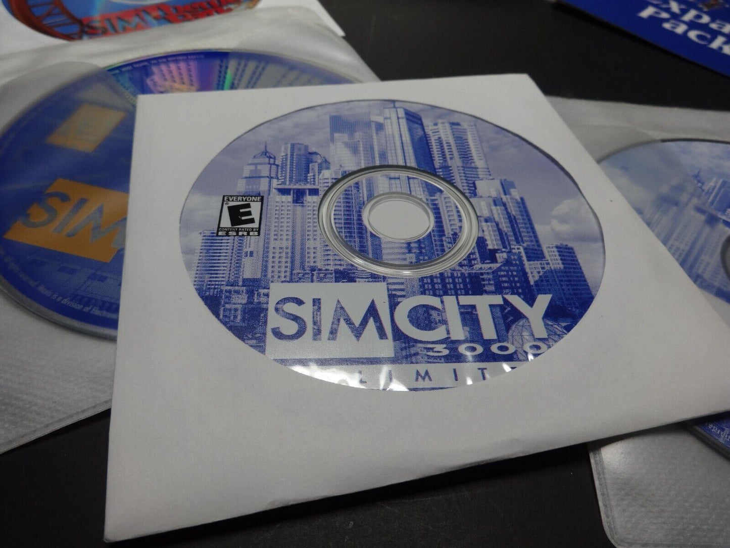The SIM Collection Theme Park SimCity 3000 The Sims Deluxe The Sims Online