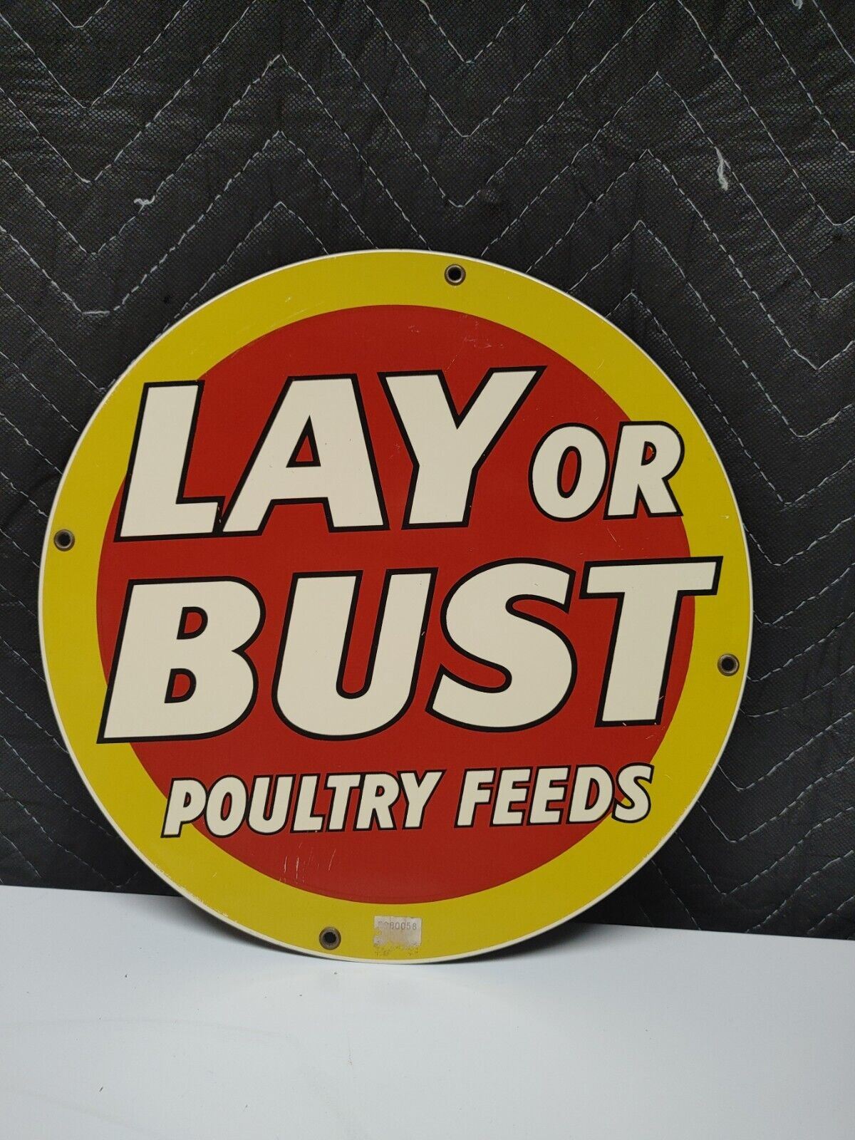 Andy Rooney porcelain metal sign - Lay or Bust