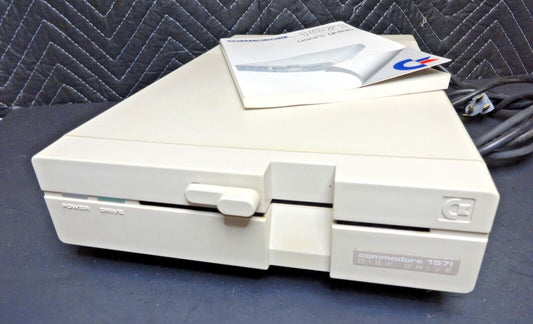 COMMODORE 1571 FLOPPY DRIVE w/ Manual & Cords - 5.25" FOR C64 64C PLUS/4 128