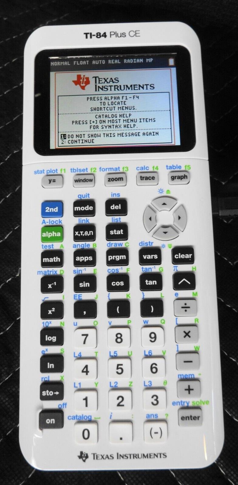 Texas Instruments TI-84 Plus CE Graphing Calculator - White With Cover & Charger