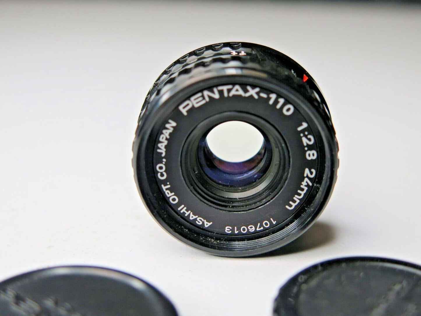 Asahi Opt Co PENTAX 110 24mm f2.8 Lens for PENTAX AUTO 110 JAPAN 1:2:8 w/ Caps