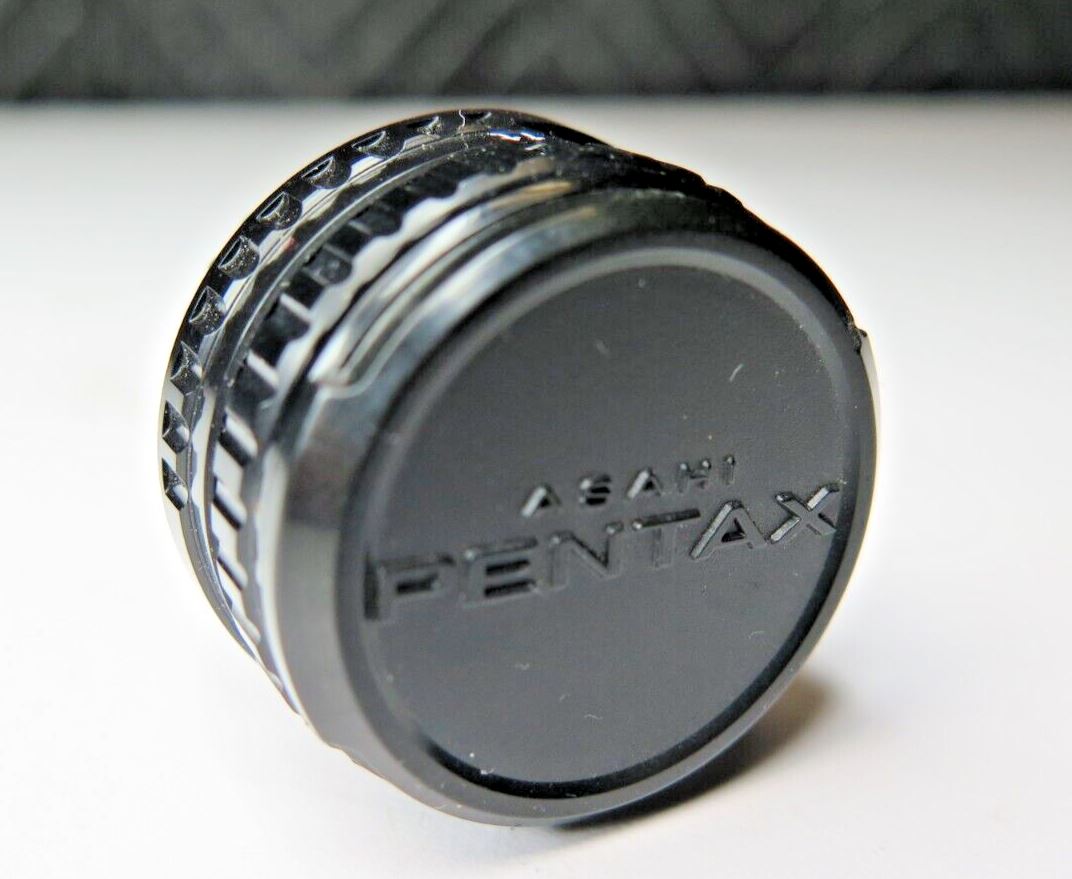 Asahi Opt Co PENTAX 110 24mm f2.8 Lens for PENTAX AUTO 110 JAPAN 1:2:8 w/ Caps