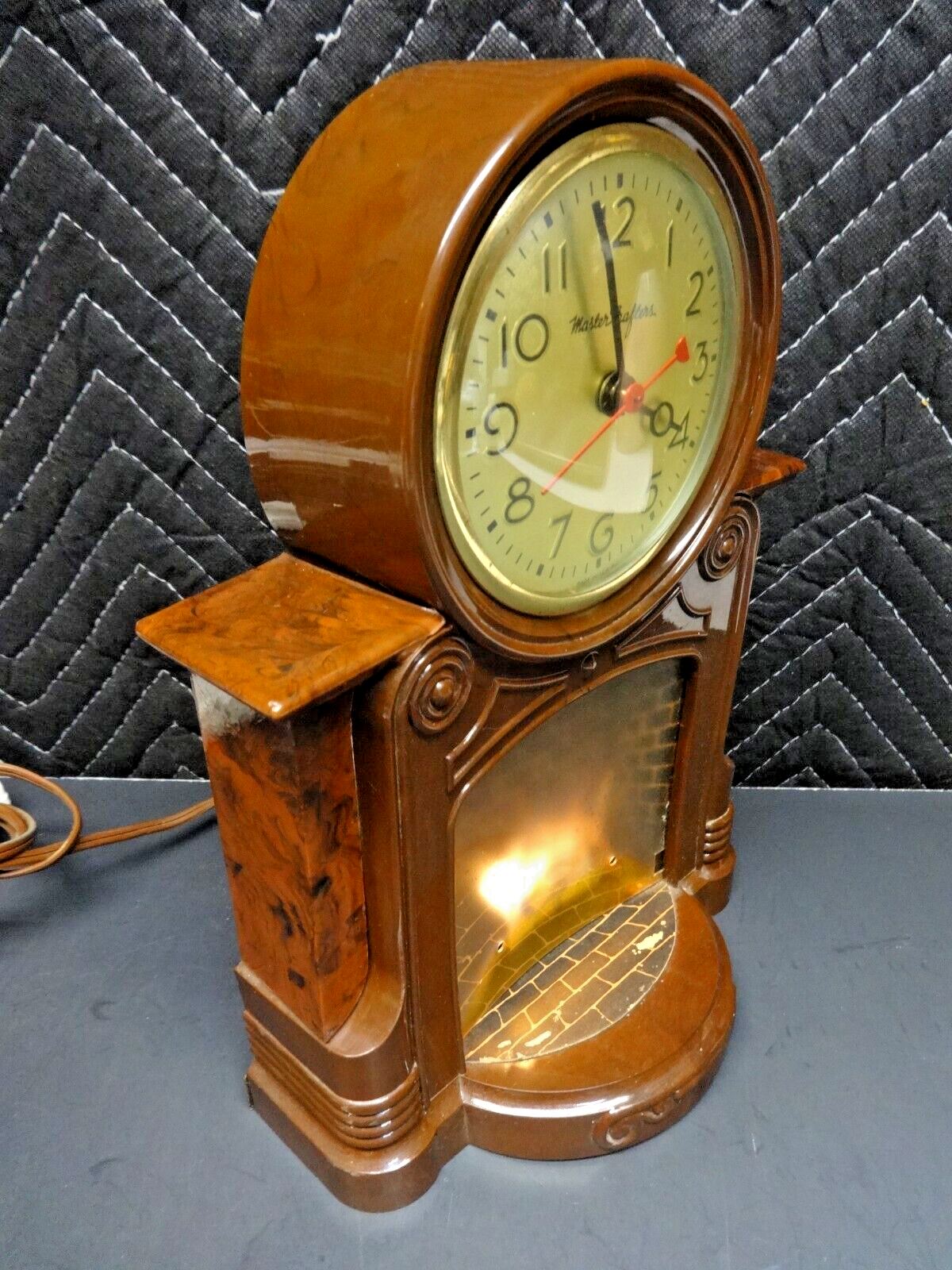 VTG MASTER CRAFTERS ANIMATED MOTION LIGHT FIREPLACE CLOCK 1950'S MODEL 272 U.S.A