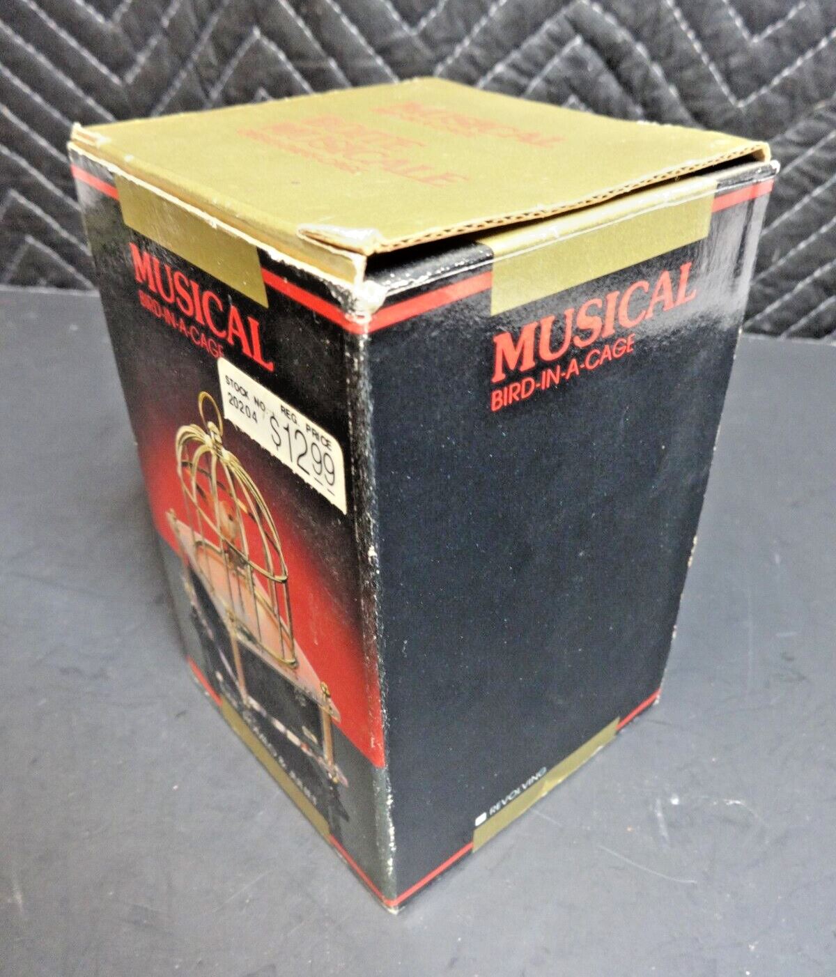 NOS VTG MUSICAL BIRD IN A CAGE BOX PLAYS ROMEO & JULIE TUNE ACTION INDUSTRIES