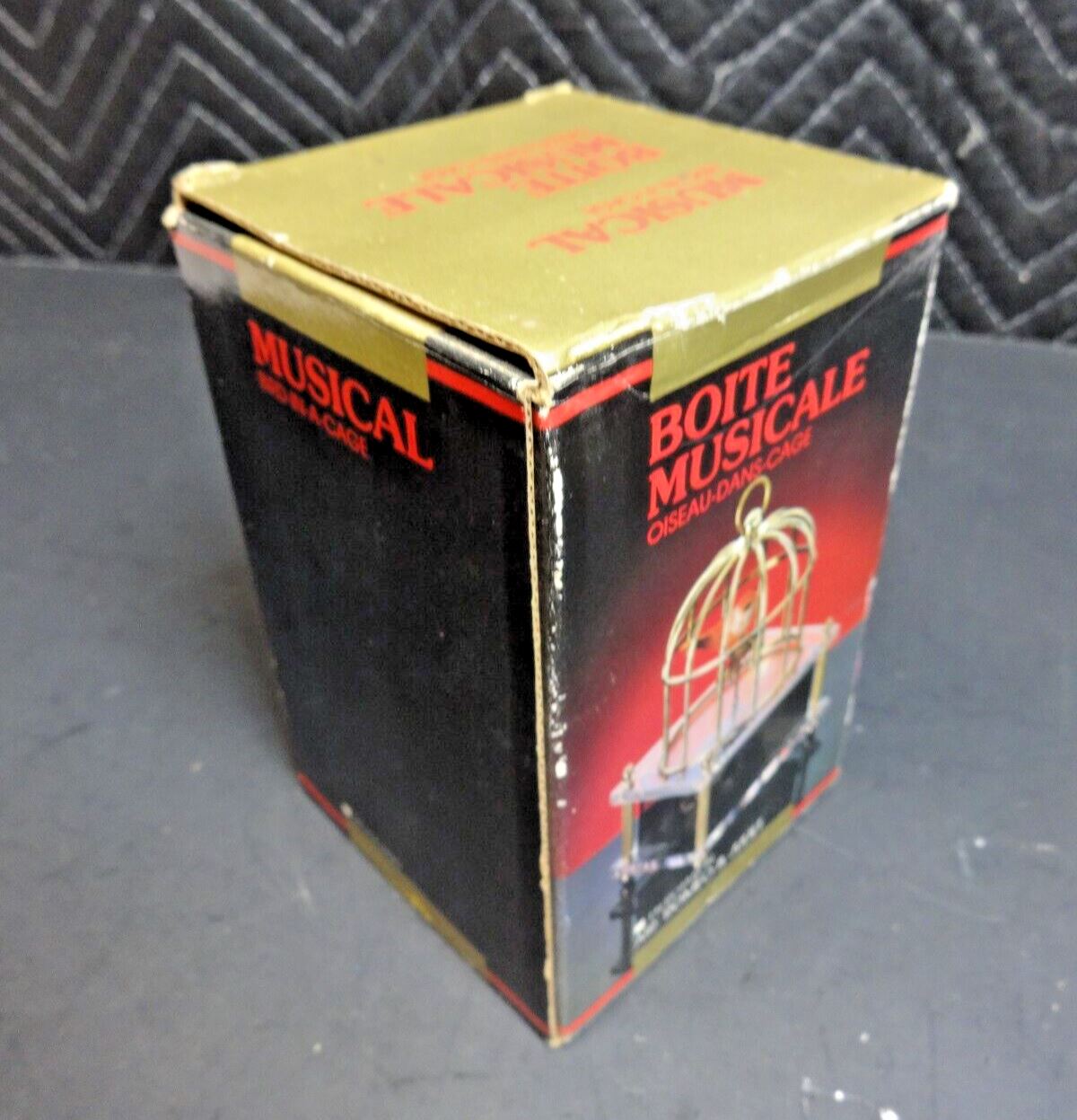 NOS VTG MUSICAL BIRD IN A CAGE BOX PLAYS ROMEO & JULIE TUNE ACTION INDUSTRIES