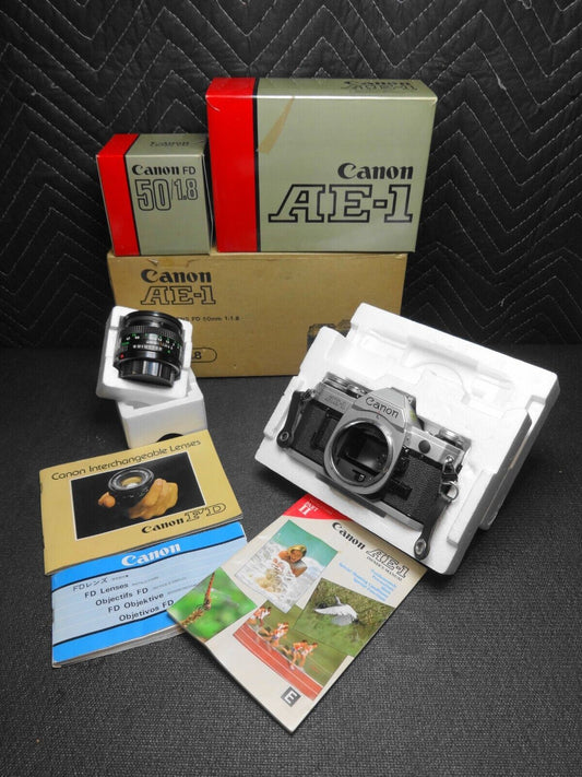 Canon AE1 Film Camera, FD 50mm 1.8 Lens w/cap Plus Original Boxes & Manuals