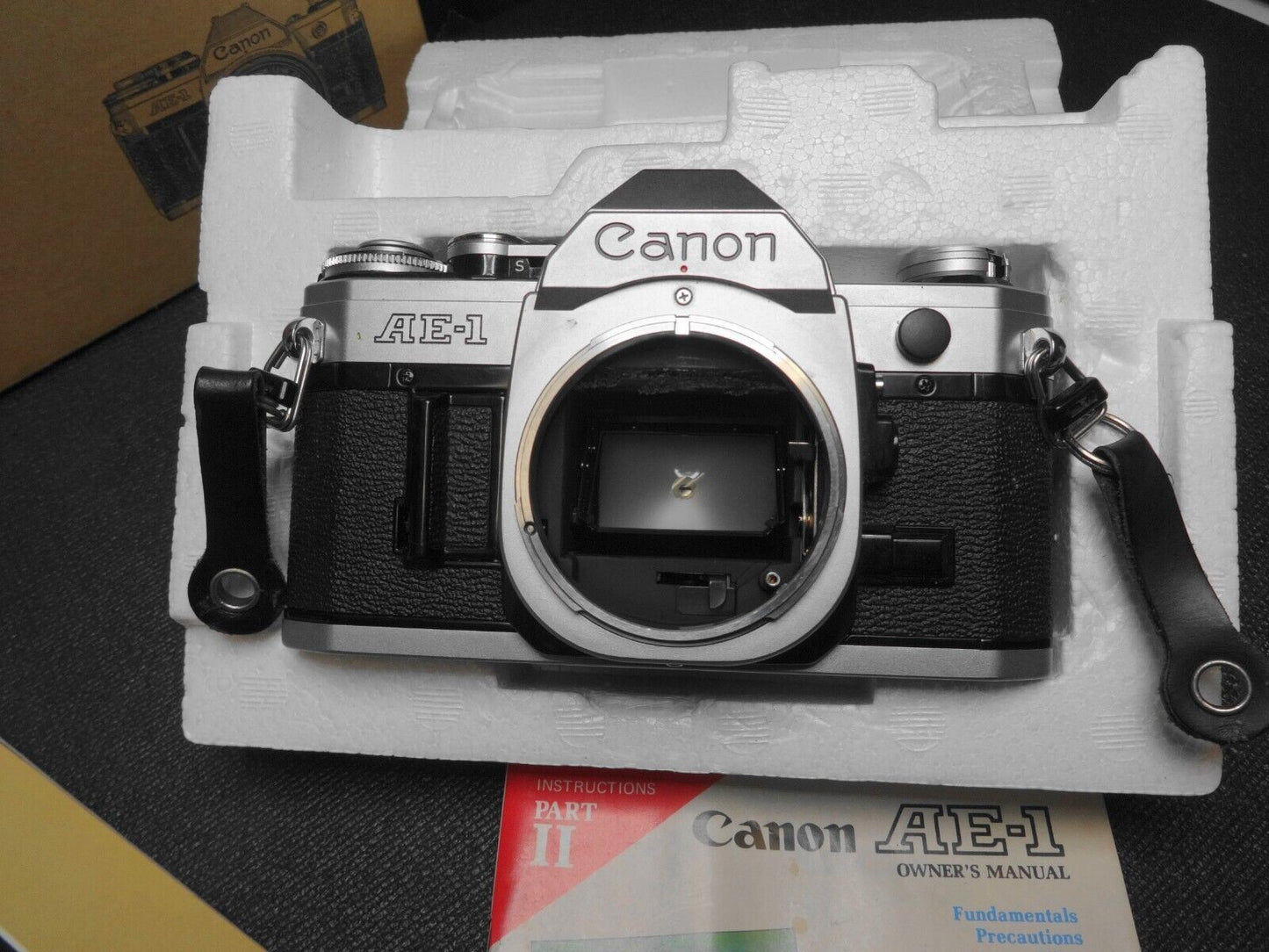 Canon AE1 Film Camera, FD 50mm 1.8 Lens w/cap Plus Original Boxes & Manuals