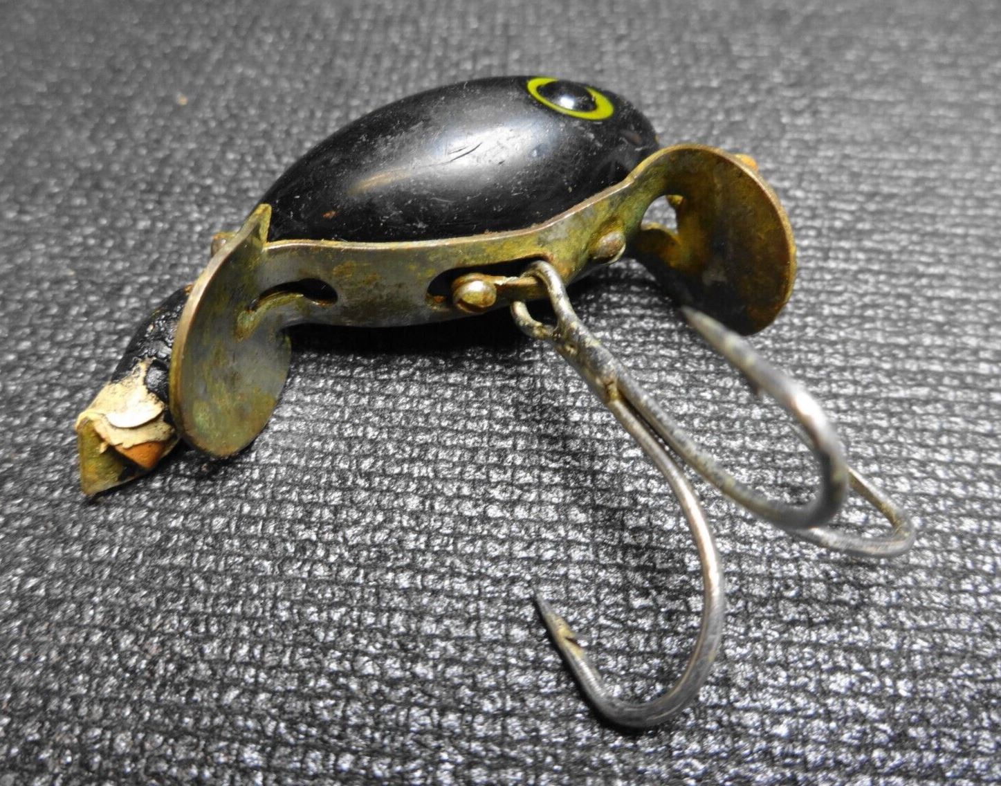 Appât de pêche vintage Heddon RARE noir HONG KONG billet marqué Appât de pêche vintage Heddon RARE noir HONG KONG billet marqué