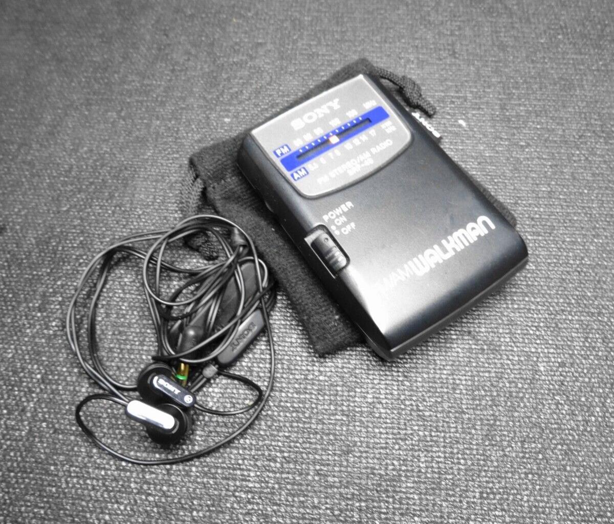 Vintage Sony Walkman SRF-49 FM Portable Radio W/ Belt Clip + Earbud Headphones